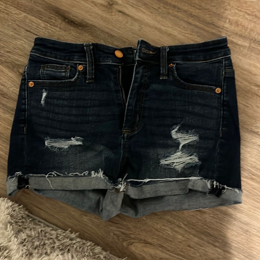 dark blue distressed jean shorts